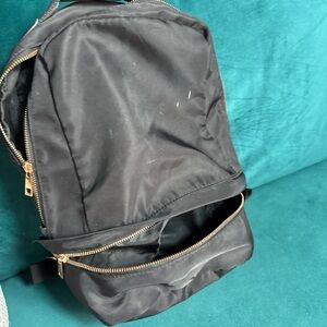 Black Backpack with Gold Accents
